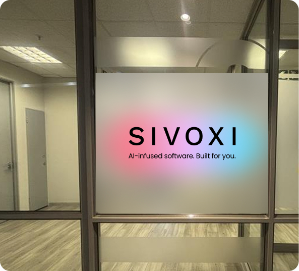The SIVOXI office with the logo and tagline printed on a frosted glass wall