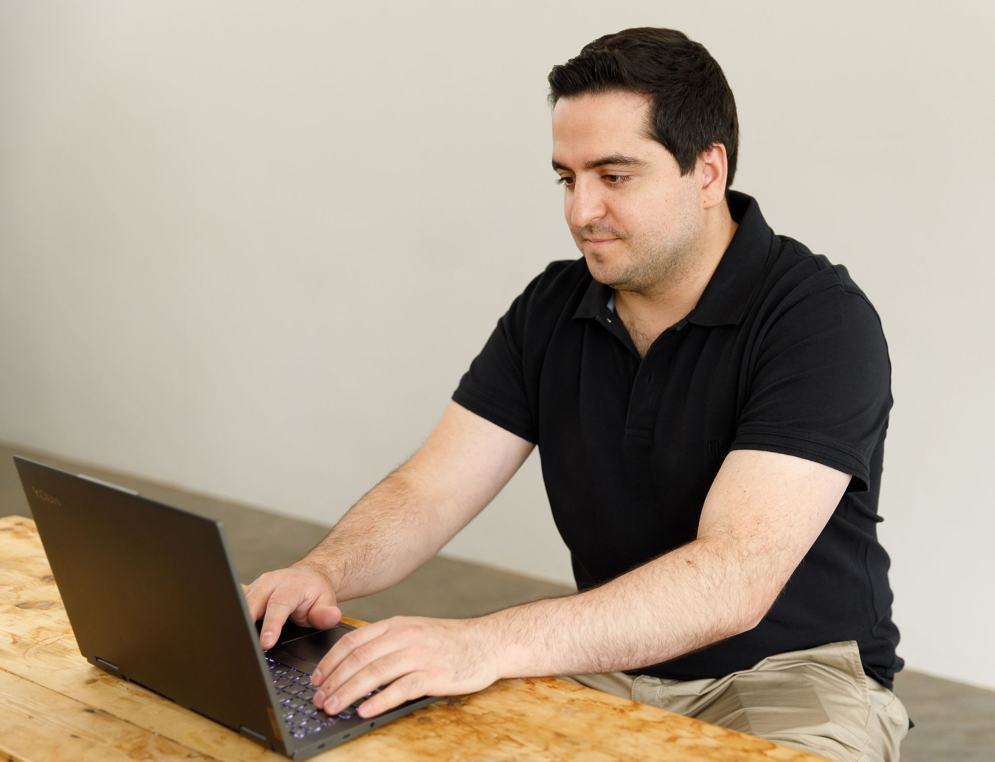 SIVOXI team member working at a desk